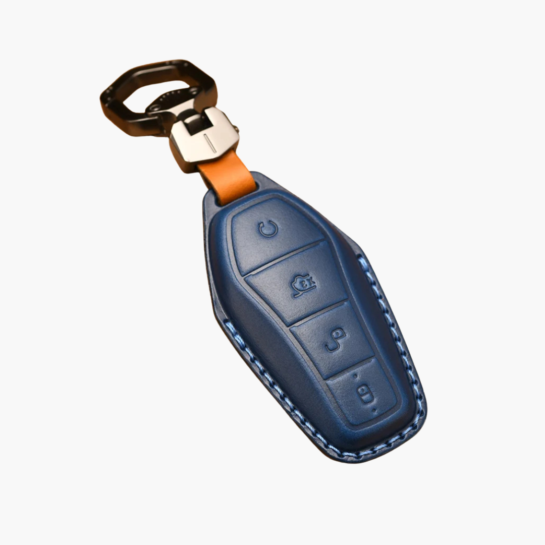Blue car key fob with keychain on a white background