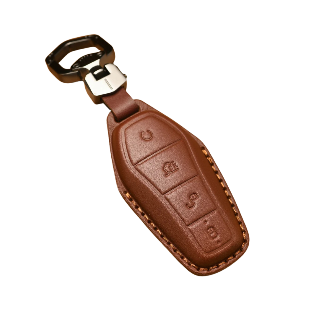 Brown leather key fob with metallic clip on a white background